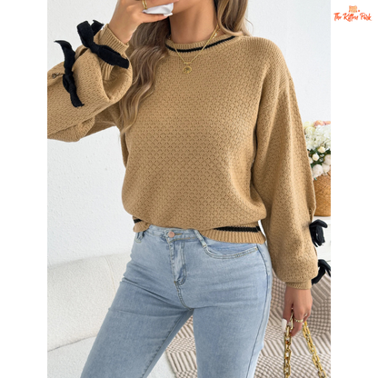 Acrylic knit 2026 Women’s Color Block Bow Knit Sweater with lantern sleeves, striped pattern, and bow detail in a casual autumn/winter style.