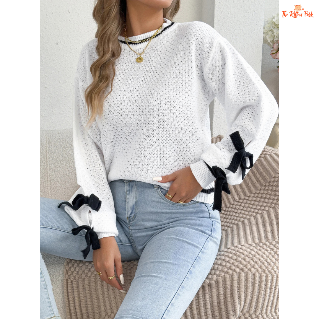 Acrylic knit 2026 Women’s Color Block Bow Knit Sweater with lantern sleeves, striped pattern, and bow detail in a casual autumn/winter style.