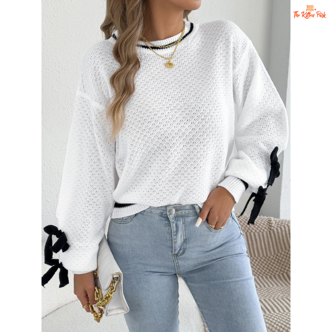 Acrylic knit 2026 Women’s Color Block Bow Knit Sweater with lantern sleeves, striped pattern, and bow detail in a casual autumn/winter style.