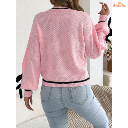 Acrylic knit 2026 Women’s Color Block Bow Knit Sweater with lantern sleeves, striped pattern, and bow detail in a casual autumn/winter style.
