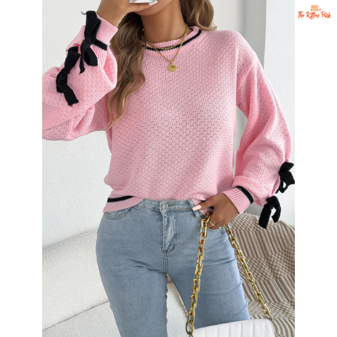 Acrylic knit 2026 Women’s Color Block Bow Knit Sweater with lantern sleeves, striped pattern, and bow detail in a casual autumn/winter style.