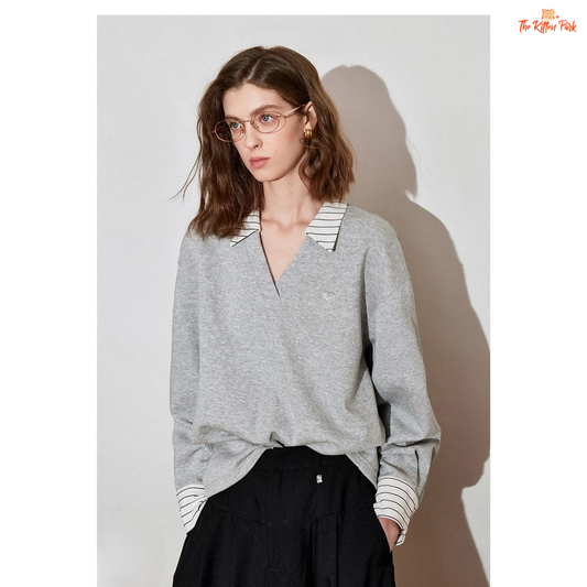 2026 Women's V-Neck Fake Two-Piece Color Block Pullover with navy and grey tones, loose fit, drop sleeves, and office-lady casual style.