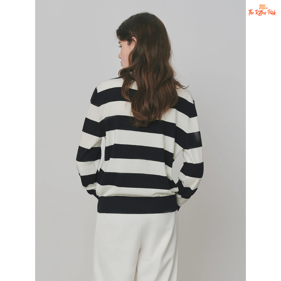 2026 Women's V-neck Striped Fake Two-Piece Wool Sweater with layered look, striped knit pattern, and casual autumn/winter style.
