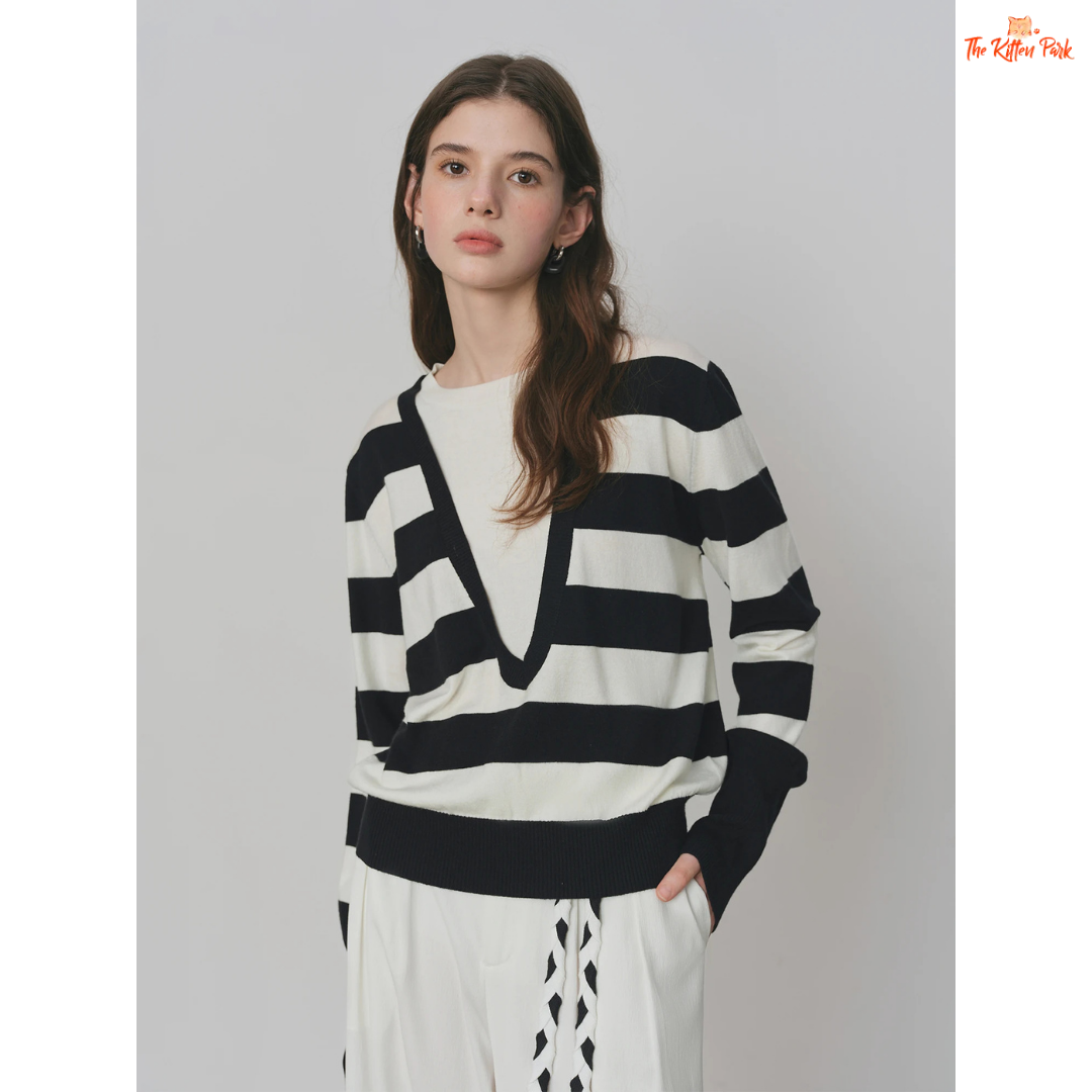 2026 Women's V-neck Striped Fake Two-Piece Wool Sweater with layered look, striped knit pattern, and casual autumn/winter style.