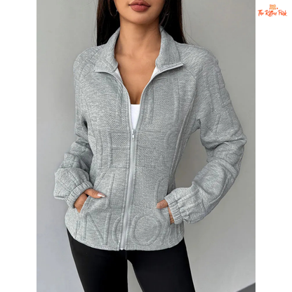 A light gray 3D jacquard turtleneck zipper coat for women featuring a turn-down collar, slim fit, zip closure, and thick fabric for sporty autumn streetwear looks.