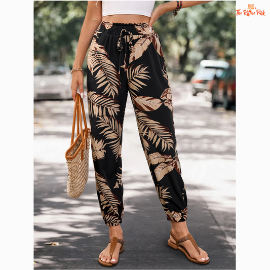 Women's casual jogger pants with floral plant print, side pockets, and relaxed fit — ideal for summer comfort and casual streetwear.