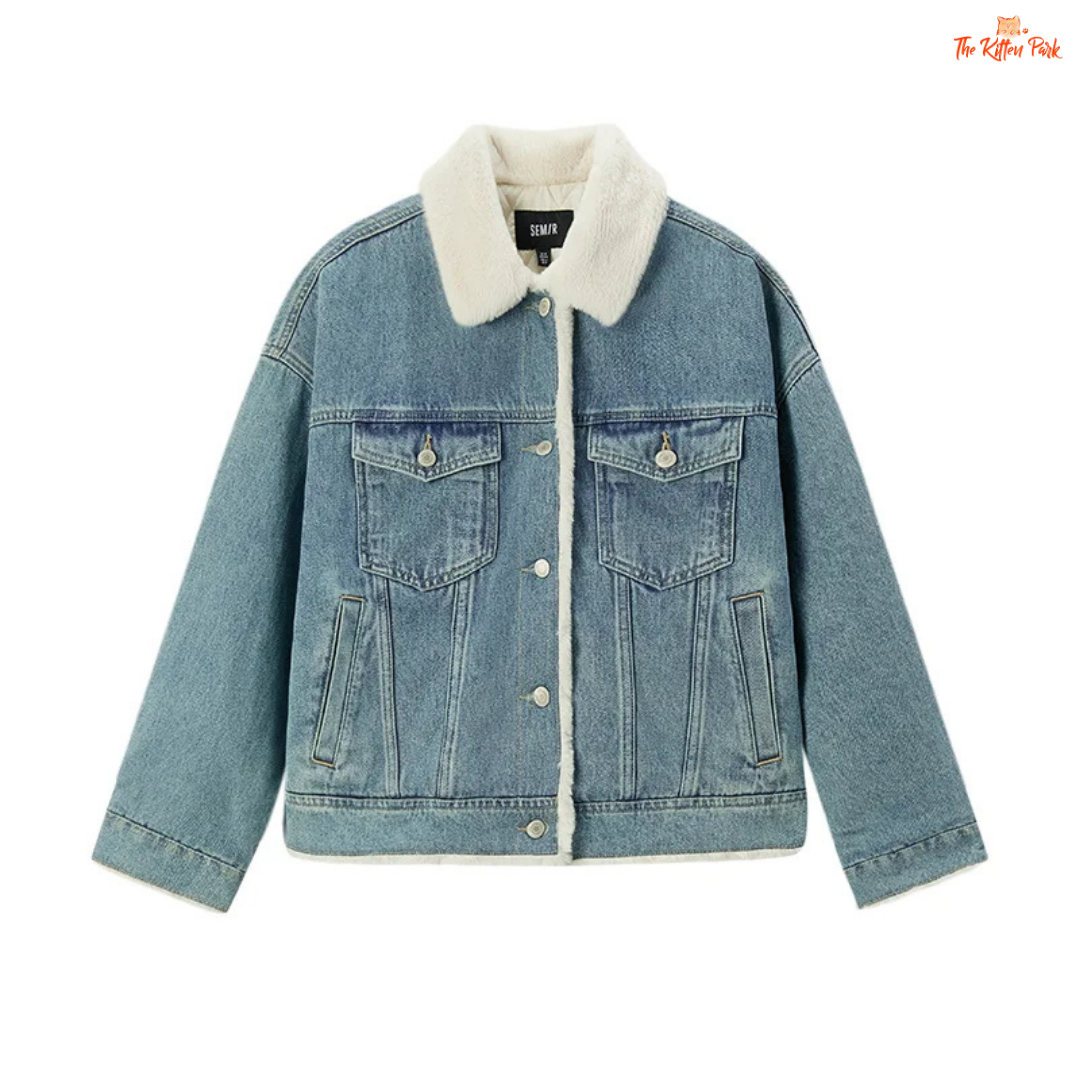 A women’s patchwork denim jacket with quilted design, faux fur lapel, and single-breasted closure for cozy winter wear.