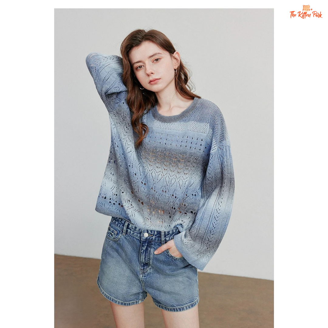 Women’s striped wool-blend pullover with loose fit, round neck, and bohemian style, designed for cozy autumn and winter wear.