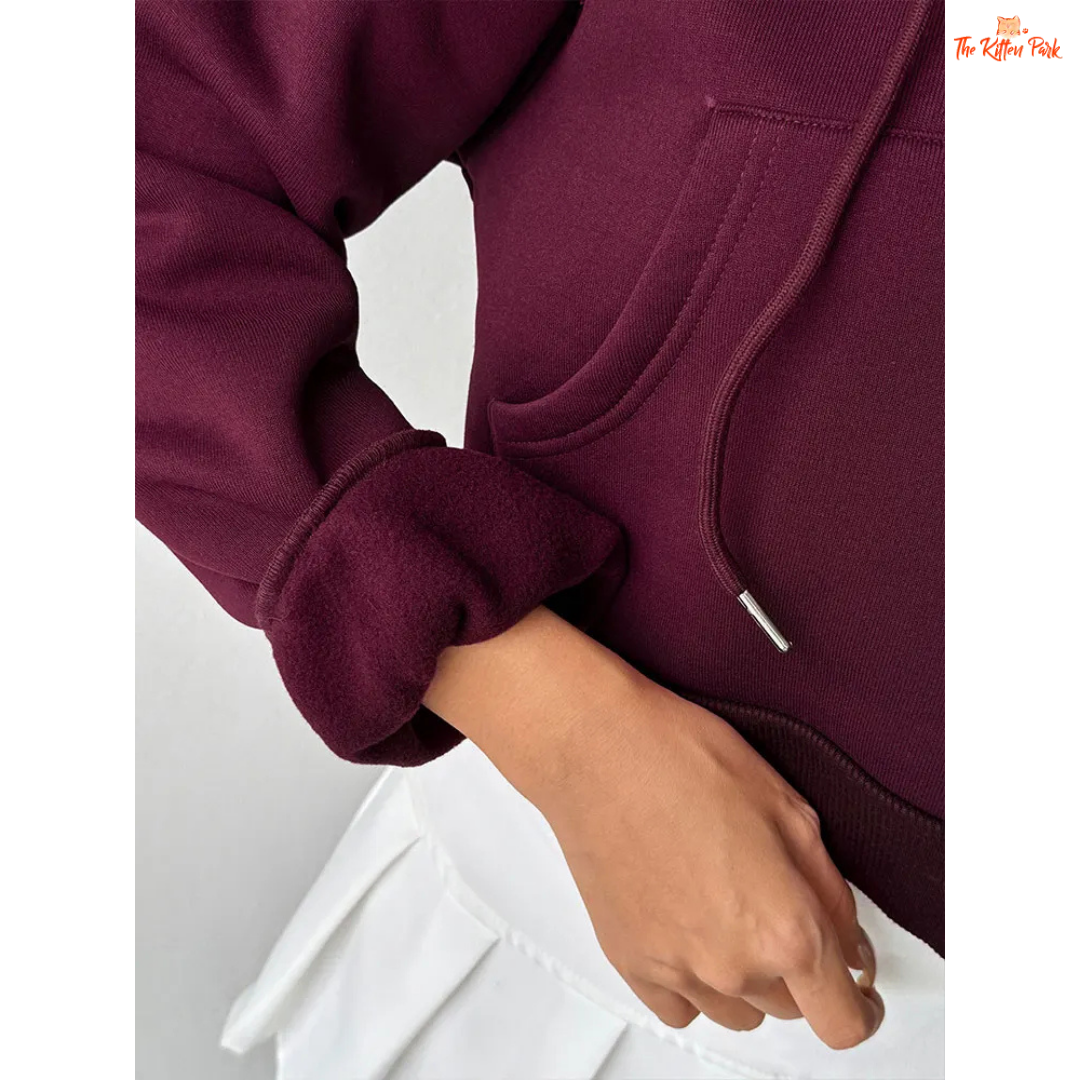 A wine-red women's autumn lace-up hoodie with zipper closure, hood, and pockets — thick knit streetwear pullover for casual comfort.