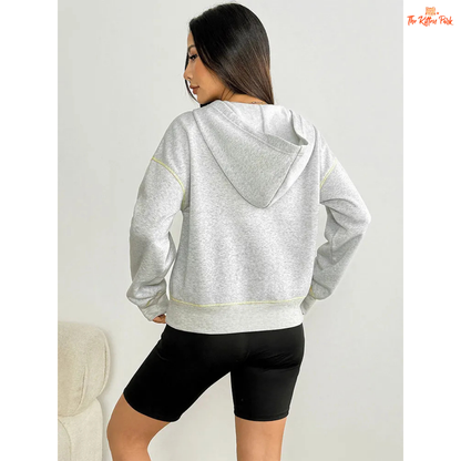 Women’s Autumn Streetwear Sports Hoodie featuring a soft fur liner, half-zip front, and hooded slim-fit pullover design in light grey tones.