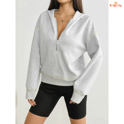 Women’s Autumn Streetwear Sports Hoodie featuring a soft fur liner, half-zip front, and hooded slim-fit pullover design in light grey tones.