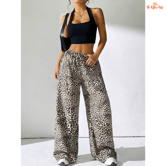 Women's full-length leopard print trousers with lace-up waist and pockets, featuring a straight-leg fit and casual elegance.