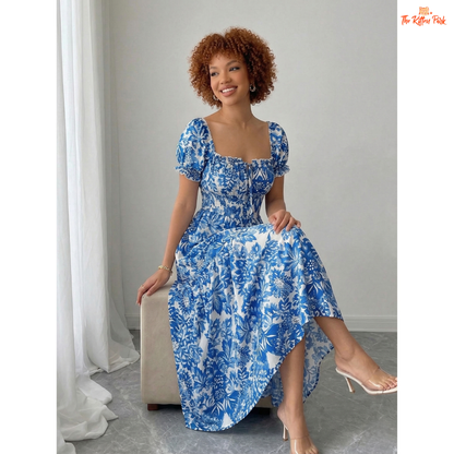 Blue floral maxi dress with puff sleeves, square neckline, tie front bow, and flowy A-line silhouette for summer.