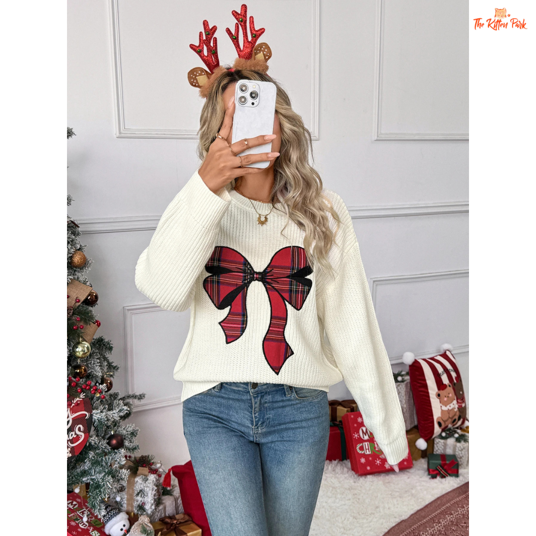 Bow Print Christmas Sweater featuring a festive bow and butterfly pattern, round neck, and soft acrylic knit for a cozy holiday look.