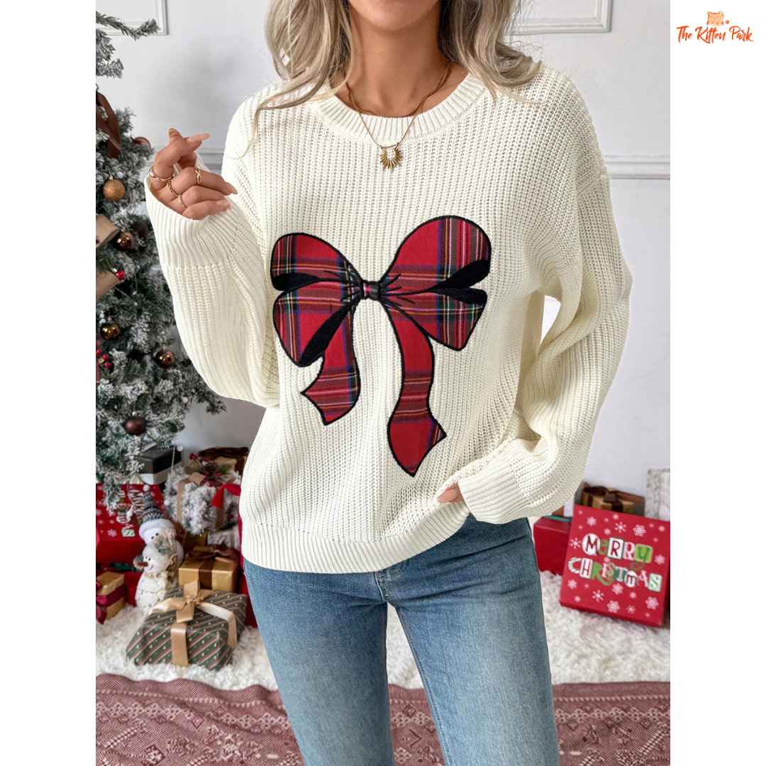 Bow Print Christmas Sweater featuring a festive bow and butterfly pattern, round neck, and soft acrylic knit for a cozy holiday look.