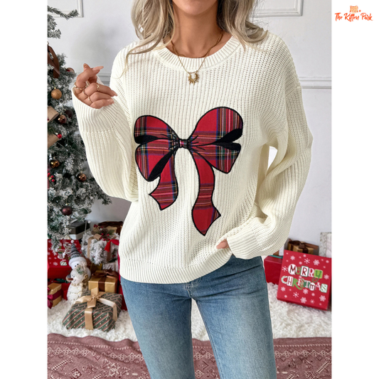 Bow Print Christmas Sweater featuring a festive bow and butterfly pattern, round neck, and soft acrylic knit for a cozy holiday look.