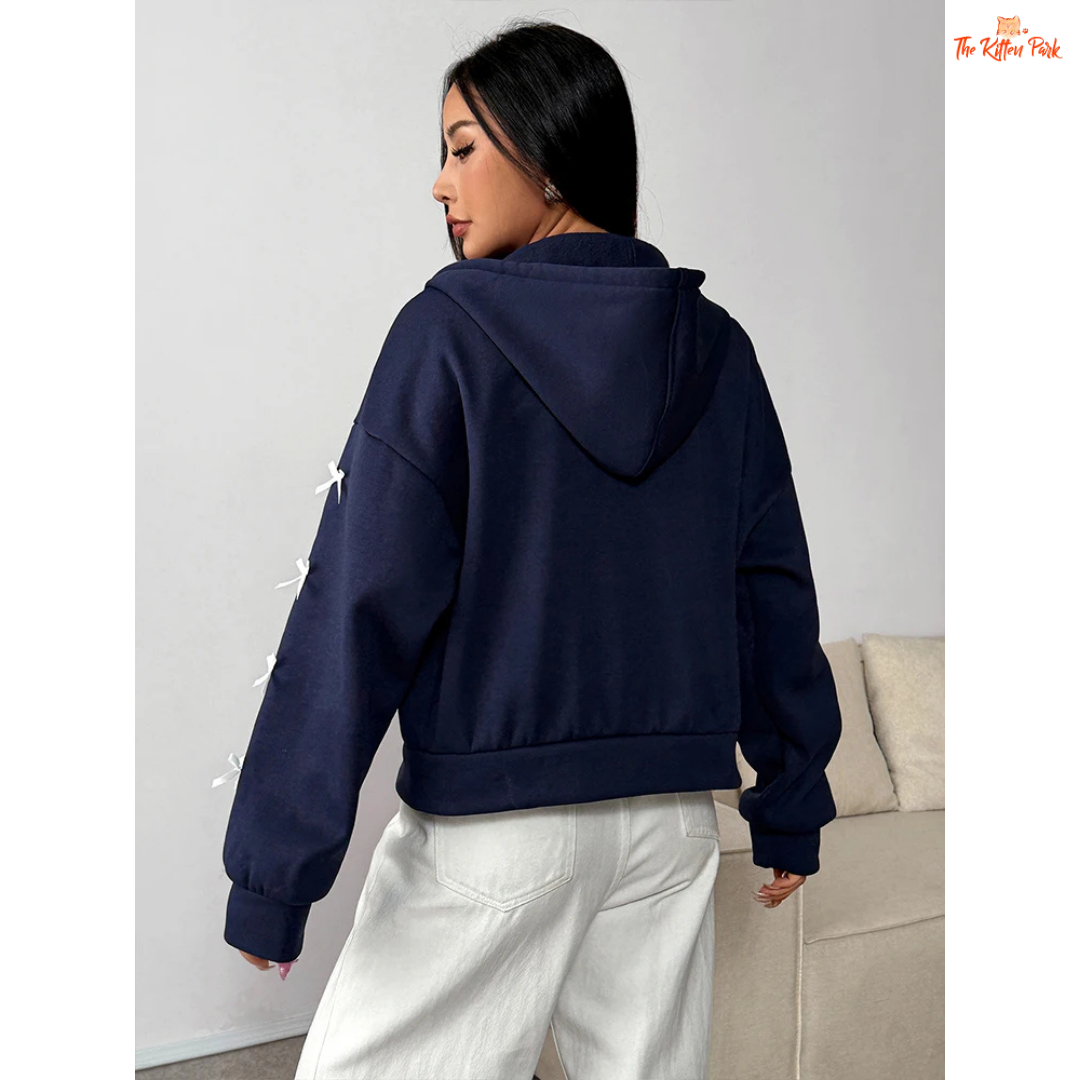 A light navy blue bow zipper hoodie with pockets for women, featuring a faux fur liner, loose fit, and cozy autumn streetwear design.