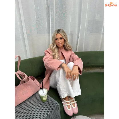 Women's pink suede coat with zipper closure and pockets, elegant long sleeve high street fashion jacket for autumn and winter.