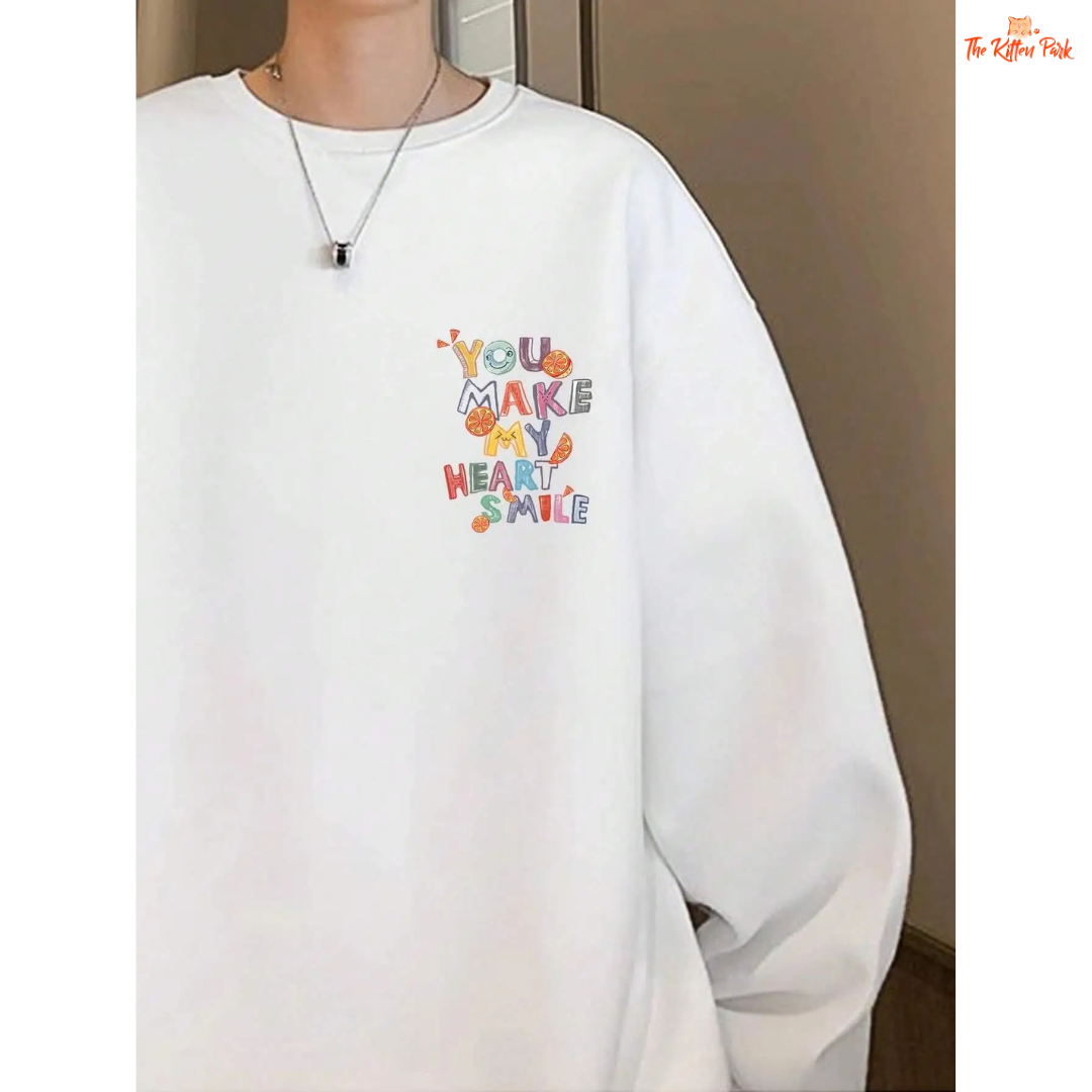 A women’s cozy fleece pullover sweatshirt in off-white with the printed phrase "You Make My Heart Smile," featuring a loose fit and O-neck design.