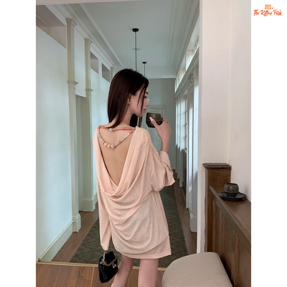 Long beige knit tee for women featuring a cowl neckline, hand-painted print, beaded accents, and a loose fit for stylish autumn layering.