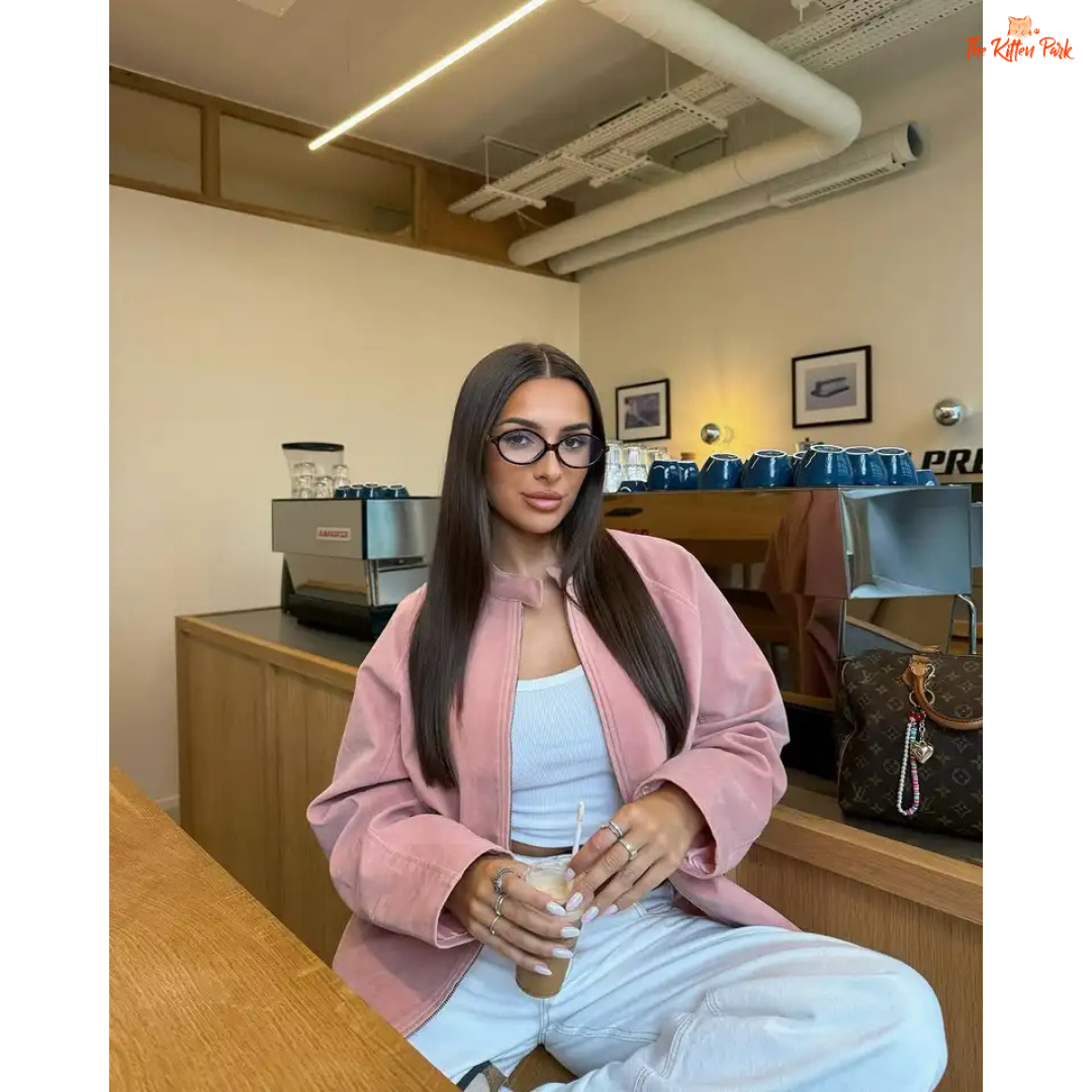 Women's pink suede coat with zipper closure and pockets, elegant long sleeve high street fashion jacket for autumn and winter.