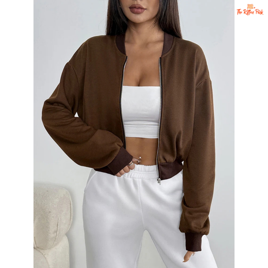 A camel-colored streetwear jacket for women featuring a thick zip-up design, O-neck collar, and button details — perfect for cozy autumn outfits.