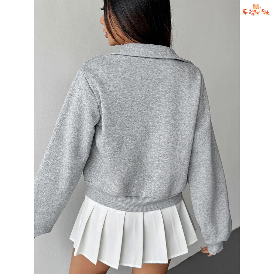 A light gray casual streetwear jacket for women with a turn-down collar, lace details, and a zip-up front — ideal for autumn sporty or relaxed outfits.