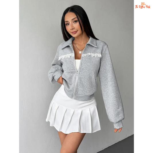A light gray casual streetwear jacket for women with a turn-down collar, lace details, and a zip-up front — ideal for autumn sporty or relaxed outfits.