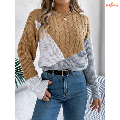 A women’s acrylic pullover sweater with color block patchwork design, O-neck, and full sleeves, crafted in heavyweight knit for autumn and winter wear.
