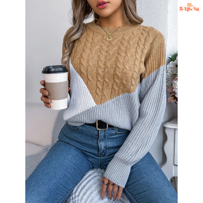 A women’s acrylic pullover sweater with color block patchwork design, O-neck, and full sleeves, crafted in heavyweight knit for autumn and winter wear.