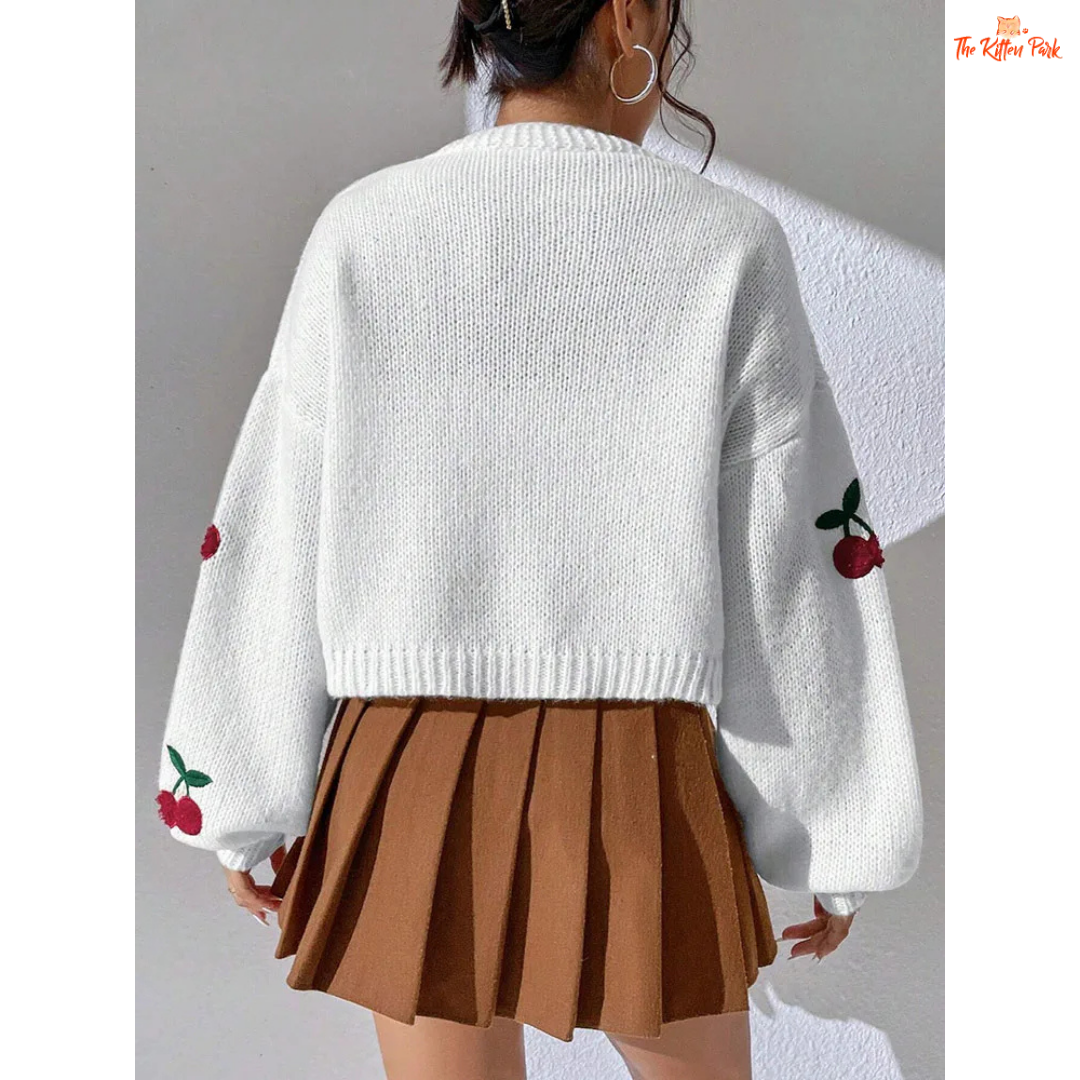 Cherry Embroidery Knit Cardigan — women’s loose commuter sweater with playful cherry embroidery, polyester knit, open stitch closure, and casual high-street autumn/winter style.