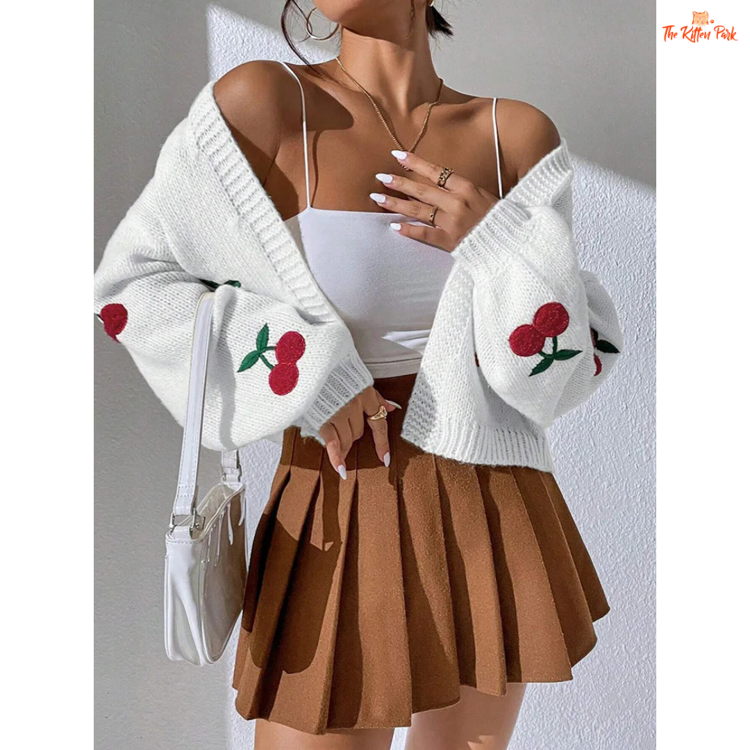Cherry Embroidery Knit Cardigan — women’s loose commuter sweater with playful cherry embroidery, polyester knit, open stitch closure, and casual high-street autumn/winter style.
