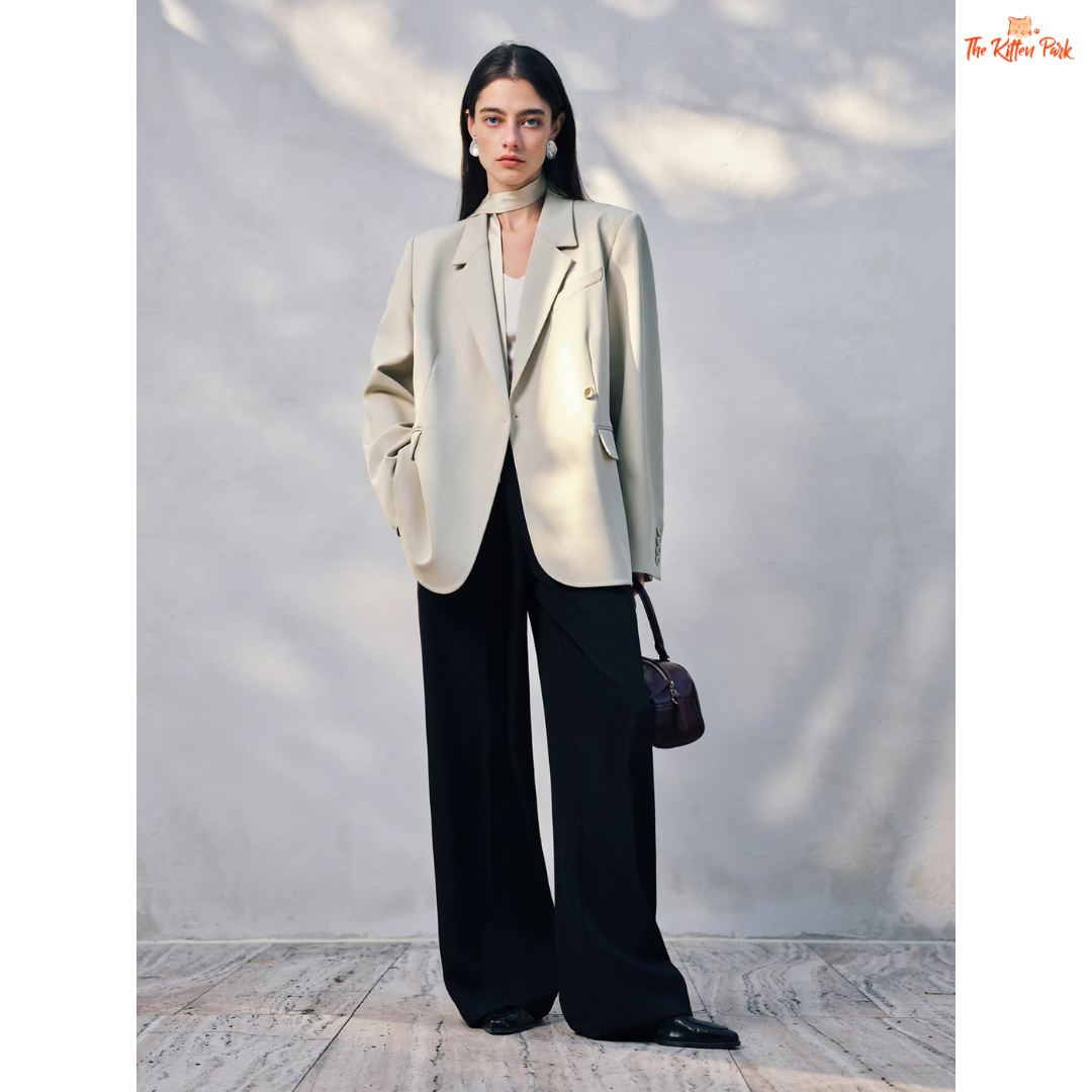 Women’s chic blazer jacket in polyester-spandex blend with single-breasted closure, button detail, and casual versatile design for spring and summer.