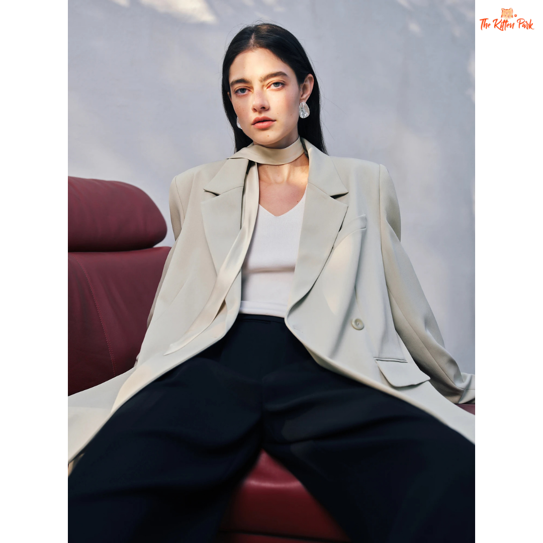 Women’s chic blazer jacket in polyester-spandex blend with single-breasted closure, button detail, and casual versatile design for spring and summer.