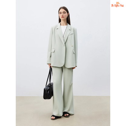 Women’s chic blazer jacket in polyester-spandex blend with single-breasted closure, button detail, and casual versatile design for spring and summer.