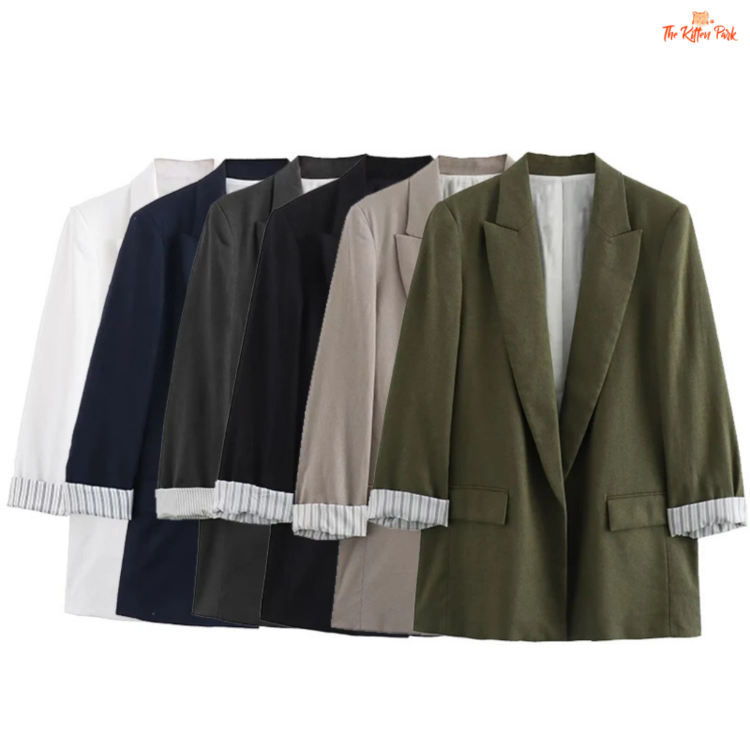 Chic women’s vintage blazer with a notched collar, long sleeves, loose fit, and pocket details in a minimalist solid design, ideal for autumn and winter wear.