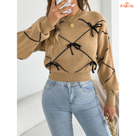 Contrast Color Bow Knit Sweater featuring pink lantern sleeves, soft acrylic knit fabric, and bow accents for a feminine autumn-winter style.