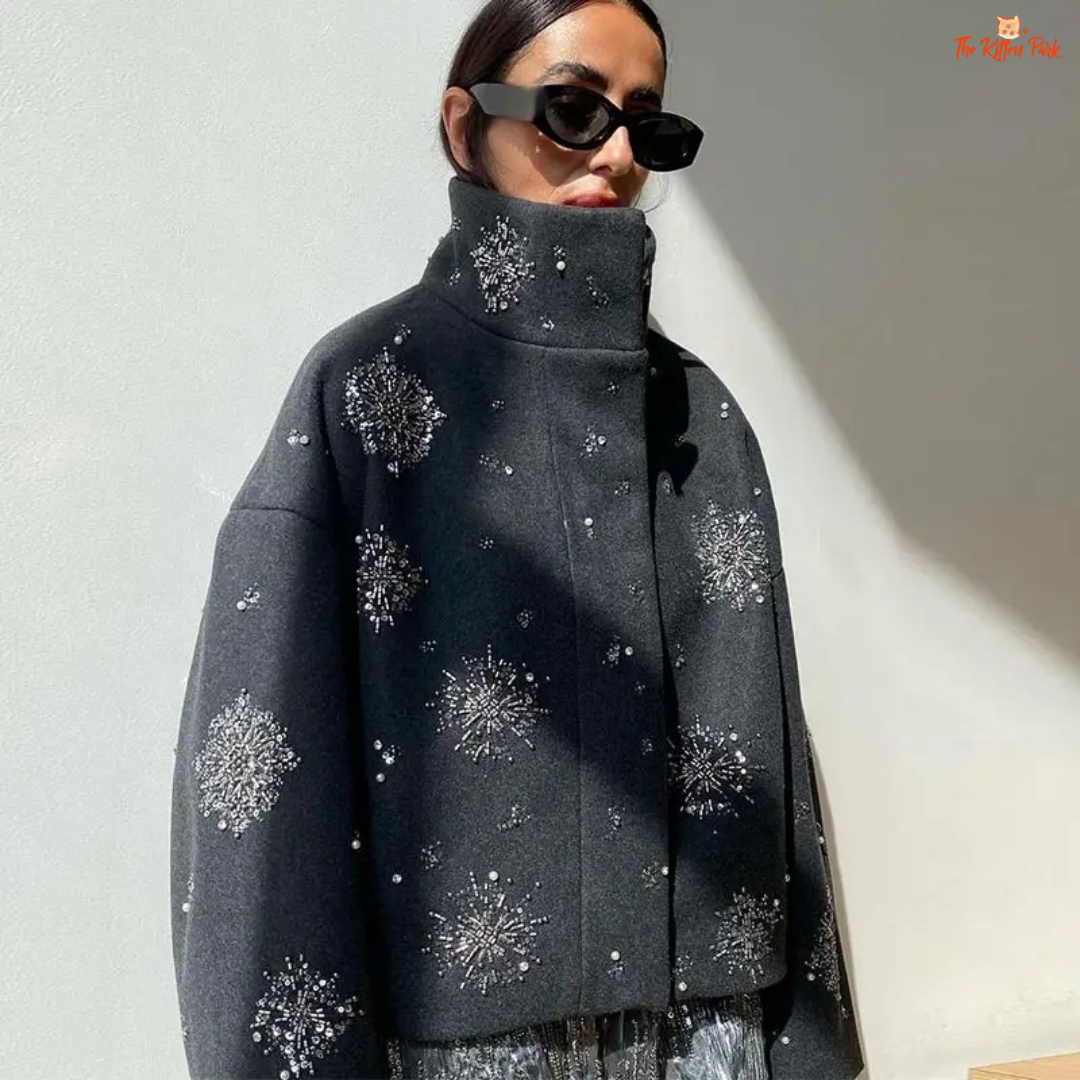 Elegant camel suede cropped jacket with turn-down collar, single-breasted closure, and button details, ideal for autumn/winter casual wear.