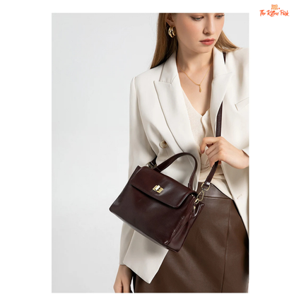 Soft cowhide leather tote bag for women featuring satchel shape, hasp closure, and multi-pocket cotton-lined interior with casual elegance.
