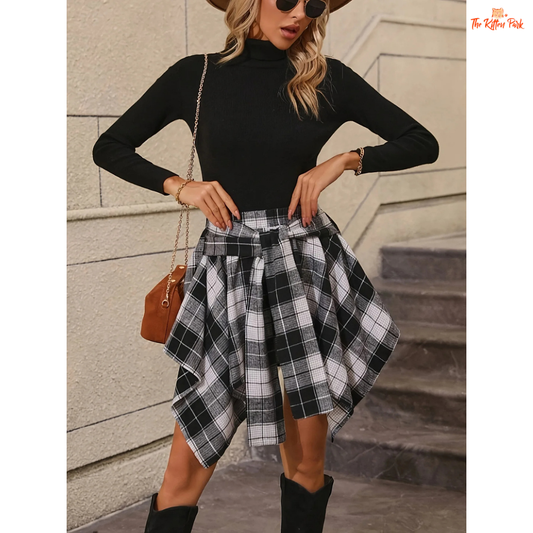 Plaid mini shirt skirt with tie sleeves and tassel detail, designed in a fake two-piece style for a bold, casual clubwear look.