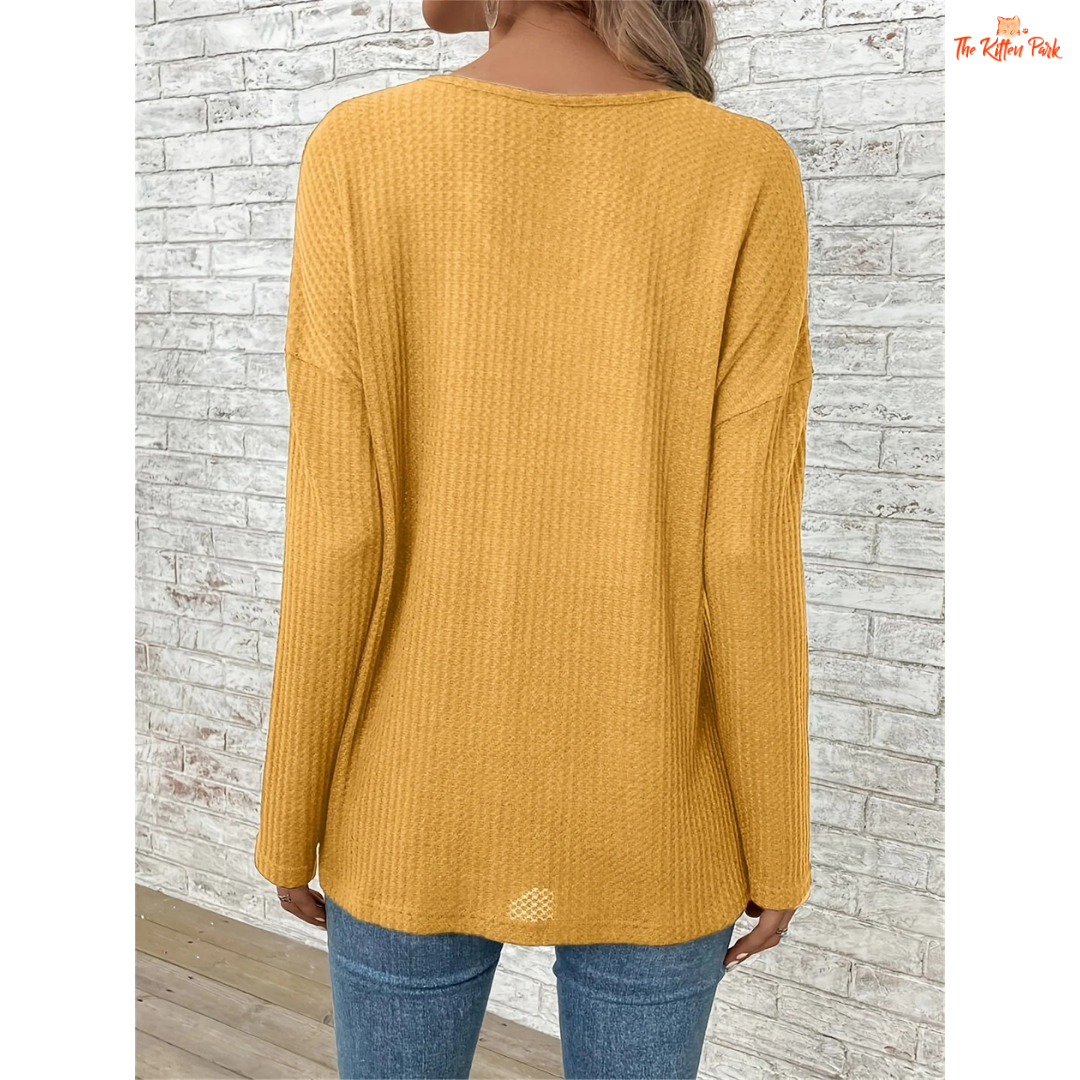 Women’s Dropped Shoulder V-Neck Solid Loose T-Shirt in mustard yellow, featuring lightweight knit fabric, casual fit, and soft blended texture for spring and summer.