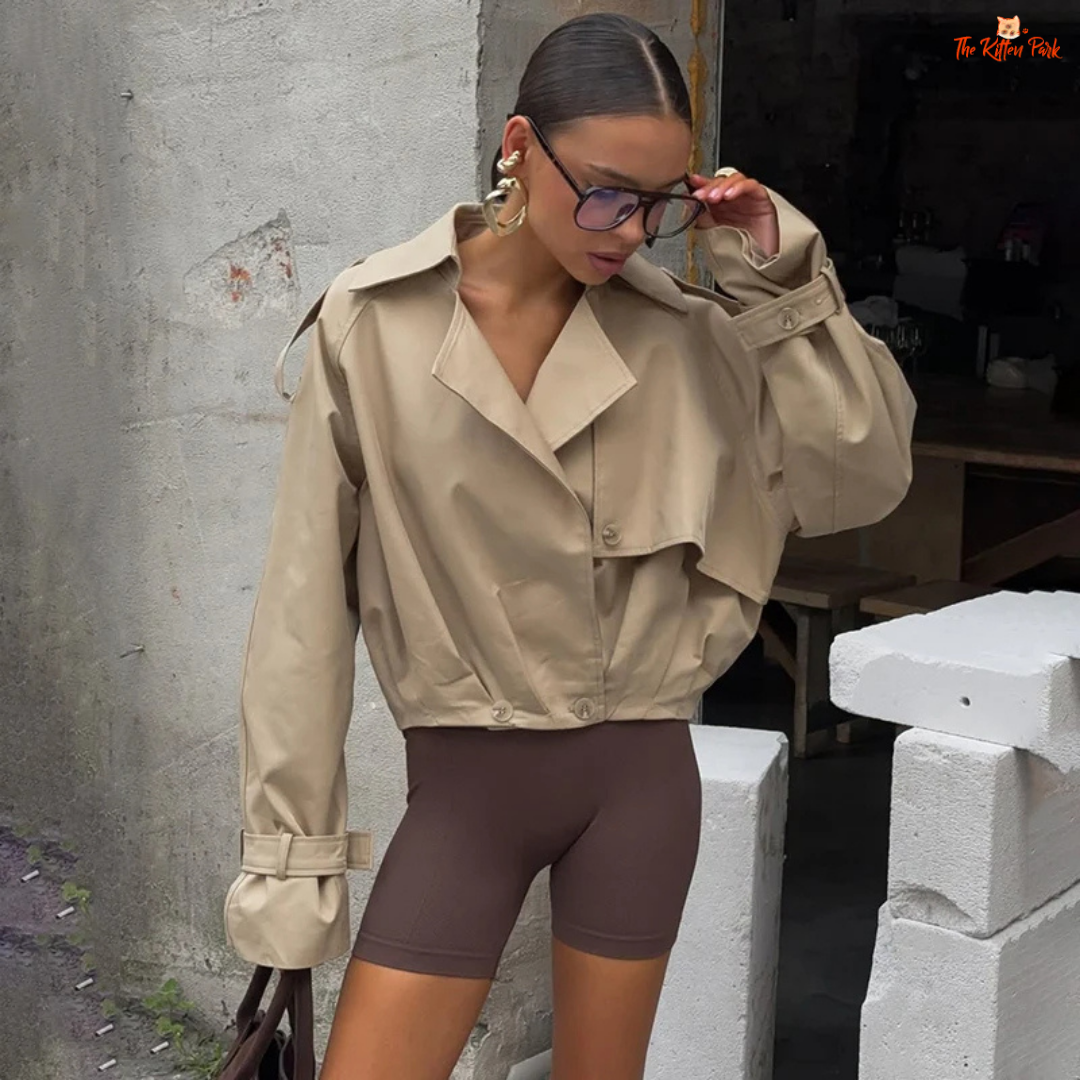 Women's autumn short double-breasted jacket with suit collar, full sleeves, button & pocket details — loose high-street coat in polyester for autumn/winter.