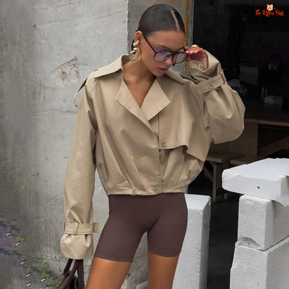 Women's autumn short double-breasted jacket with suit collar, full sleeves, button & pocket details — loose high-street coat in polyester for autumn/winter.