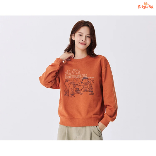 A women’s loose fit autumn sweatshirt with cartoon print, O-neck pullover design, and casual cotton-polyester blend comfort.