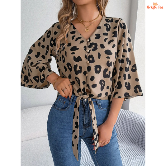 Leopard print chiffon shirt with tie-front design, half sleeves, and a relaxed casual fit—perfect for spring and summer outfits.