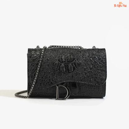 Box-shaped women's crossbody bag with sequins, animal print details, chain strap, and zippered interior for a stylish and glamorous look.