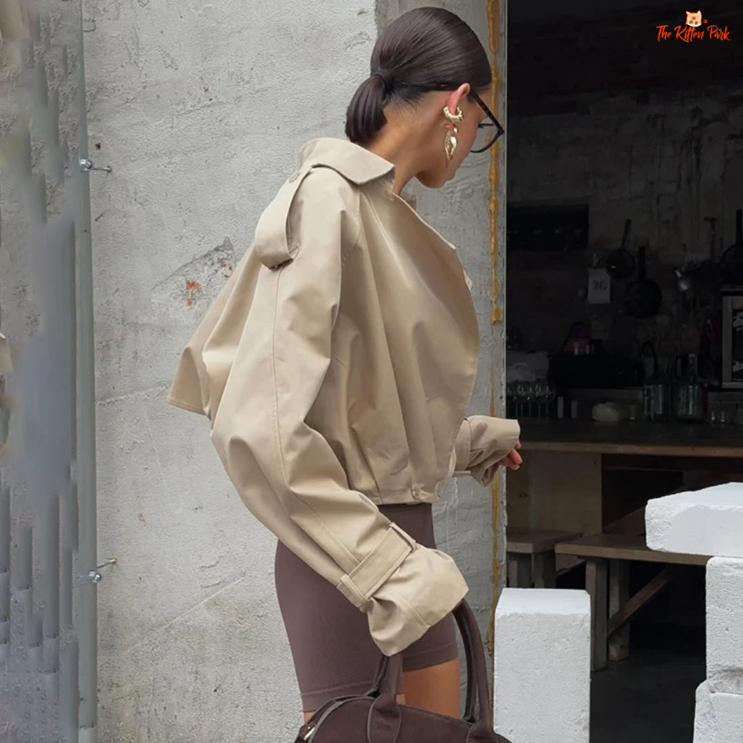 Women's autumn short double-breasted jacket with suit collar, full sleeves, button & pocket details — loose high-street coat in polyester for autumn/winter.