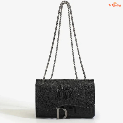 Box-shaped women's crossbody bag with sequins, animal print details, chain strap, and zippered interior for a stylish and glamorous look.
