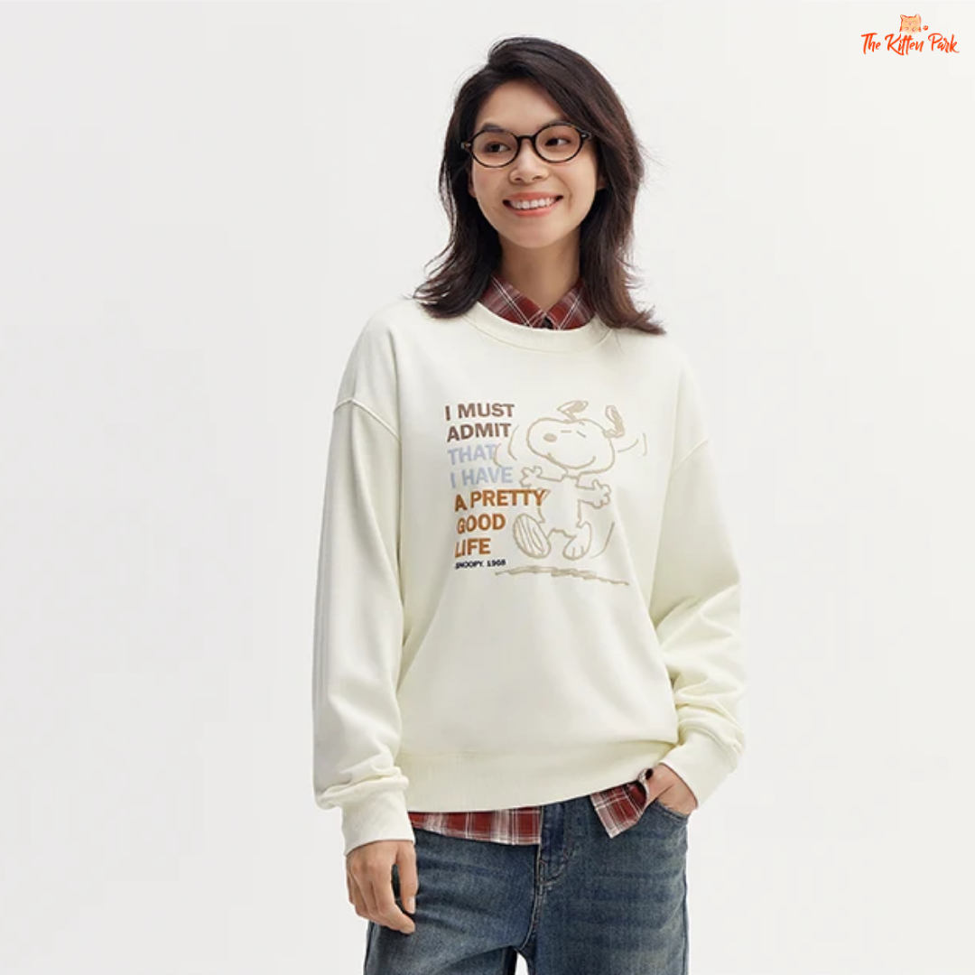 A women’s loose fit autumn sweatshirt with cartoon print, O-neck pullover design, and casual cotton-polyester blend comfort.