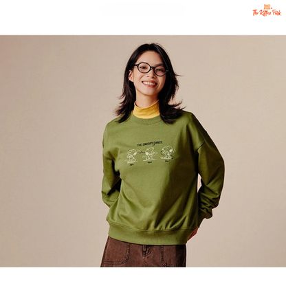 A women’s loose fit autumn sweatshirt with cartoon print, O-neck pullover design, and casual cotton-polyester blend comfort.